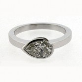 18ct white gold ring set with a pear cut diamond